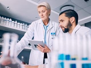 Image showing Scientist, mentor and training on tablet for data analysis, laboratory report and pharmaceutical research. Science teamwork, medical woman and man on digital technology for support and drugs solution