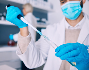Image showing Closeup, vial and hands of a scientist for research of liquid for a chemistry test in a lab. Safety, medicine and a pharmacy employee with gear for biotechnology or a technician studying a chemical