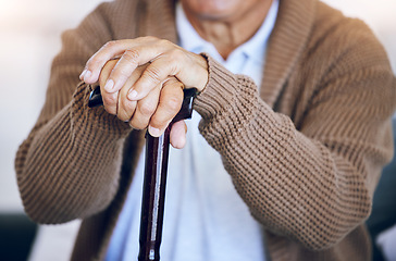 Image showing Hands, walking stick and senior person with a disability in nursing home for mobility support, help and balance closeup. Elderly patient, fingers and cane in house living room or arthritis healthcare