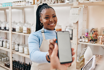 Image showing Customer, black woman and payment with smartphone screen, finance and machine for transaction in a store. Business, shop assistant and employee with client, cellphone and technology with service