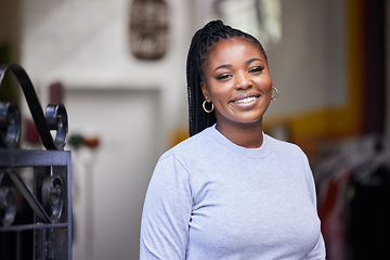 Image showing Happy, black woman and portrait in clothes store, thrift shop and fashion workshop in owner pride. Smile, confident and professional designer in clothing small business, retail and donation industry