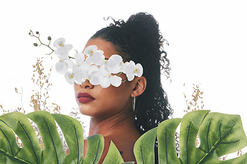 Image showing Skincare, aesthetic and face of woman with flowers for wellness, natural cosmetics and beauty in studio. Orchid, leaf and female person florals for makeup, glamour and facial on white background