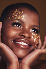 Image showing Gold, makeup and woman face closeup with a smile from luxury treatment and facial spa mask. Glitter, golden dermatology and African female person happy from skincare and golden cosmetics in studio