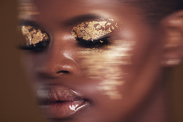 Image showing Gold beauty, blurred and black woman with face closeup with makeup and cosmetics in studio. Brown background, African female model and glitter with golden shine and glow from facial paint sparkle