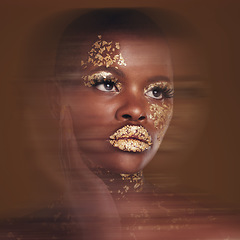 Image showing Gold beauty, makeup and black woman with blur in studio with glitter cosmetics and sparkle art. Brown background, African female model and shine from paint and skin glow with golden luxury treatment