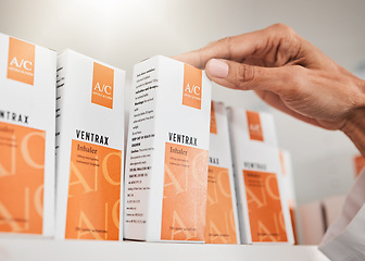 Image showing Person, pharmacist and hands with box for inventory inspection or checking stock on shelf at pharmacy. Closeup of medical or healthcare worker with pills, medication or pharmaceutical at drugstore