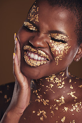 Image showing Black woman, silly face and gold makeup with luxury dermatology and skincare mask with glitter. Sparkle, smile and beauty with rich and shine of cosmetics and model in a studio with facial art