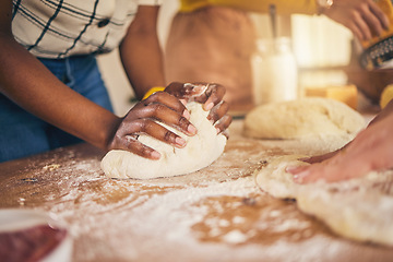 Image showing Bakery, hands and baking by people or chef on a kitchen table cooking bread, pizza or pastry with dough. Culinary, counter and person preparing food at a restaurant with ingredient or recipe