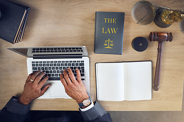 Image showing Above, hands and laptop typing for law, planning justice or working at a desk in office. Attorney, research and a lawyer or legal employee with a computer at a table for connection and communication