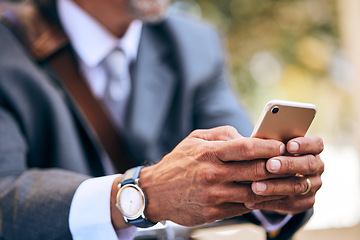 Image showing Outdoor, hands and man with smartphone, business and connection with social media, typing or network. Person, employee or entrepreneur with a cellphone, closeup or mobile app with website information