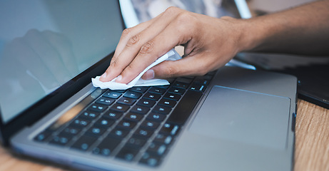 Image showing Cleaning, wipe dust and hands with laptop for hygiene, disinfection and maintenance for health in office. Technology, closeup and keyboard for bacteria, dust and dirt on computer for clean workplace