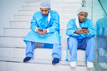 Image showing Doctor team, stairs and smartphone in hospital for telehealth, healthcare or online wellness. Phone, surgeon and people on steps on internet, reading email and medical professional research in clinic