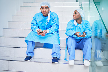 Image showing Stairs, surgeon people and phone in hospital for telehealth, healthcare or thinking. Smartphone, doctor team and people on steps on internet, reading email and medical professional research in clinic