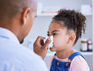 Image showing Blowing nose, child and doctor with sick, disease and virus in a hospital or clinic. Paediatrician, young girl and tissue for allergies or flu with toilet paper for medical healthcare and support