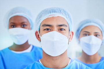 Image showing Surgeon group, face mask and people in hospital, healthcare and wellness expert in clinic. Portrait, doctor and medical professional team, nurse worker and confident surgery employee in ppe scrubs