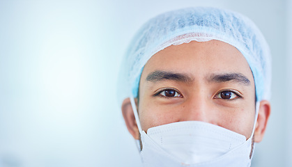 Image showing Face mask, surgeon and man in hospital in studio isolated on a white background mockup space. Portrait, doctor and medical professional nurse, healthcare worker and confident surgery employee in ppe.