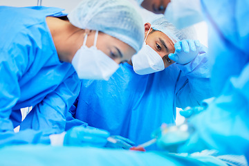 Image showing Surgery, teamwork and medical with doctors in hospital theater for operation, emergency and collaboration. Medicine, healthcare and help with group of people for safety, consulting and nursing