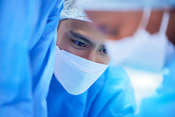 Image showing Surgery, doctors and medical with man in hospital theater for operation, emergency and collaboration. Medicine, healthcare and help with group of people in clinic for safety, consulting and nursing