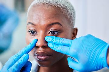 Image showing Doctor hands, woman and plastic surgery for cosmetics, aesthetic and facial transformation or nose job. Medical worker with rhinoplasty of african patient or client face, dermatology help or support