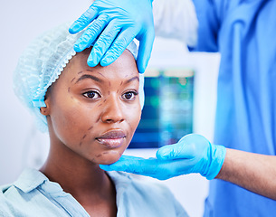 Image showing Black woman, patient and hands, plastic surgery and face with doctor, health and medical consultation with beauty. Help, medicine and cosmetic procedure, exam and healthcare with people at hospital