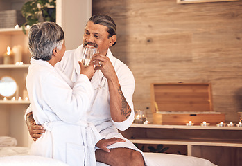 Image showing Anniversary, spa and senior couple with love, celebration and bonding with champagne, marriage and romantic retreat. Mature woman, old man and relax with alcohol glass, relationship and happiness