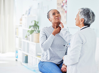 Image showing Patient, doctor and hospital for sore throat of woman for virus, pain or infection. Healthcare worker and sick African person show neck for thyroid, examination or respiratory at medical consultation