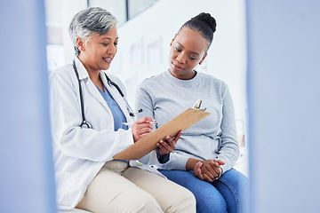 Image showing Doctor, women and checklist in healthcare support, hospital services and patient history, charts or results. Senior nurse writing on clipboard for registration, clinic sign up or medical consultation