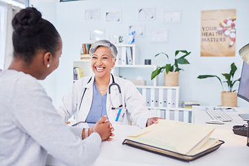 Image showing Doctor, patient and talking at happy consultation in hospital with a woman for medical advice. Healthcare worker and person for conversation, results and communication about wellness and health