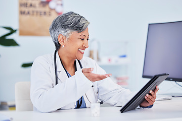 Image showing Smile, woman and doctor with a tablet, video call and connection with healthcare, help and meeting. Webinar, happy employee and medical professional with tech, medical advice and online consultation