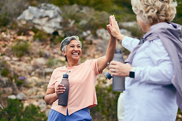 Image showing Senior women, fitness or people high five for goal or success together for outdoor exercise in retirement. Winning, diversity or happy elderly friends celebrate hiking on break in training in park