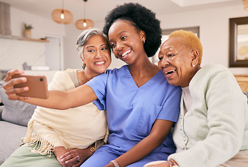 Image showing Selfie, caregiver and senior women on sofa smile for social media, online post and profile picture together. Retirement, nursing home and nurse with elderly people take photo on smartphone for memory