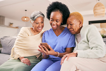 Image showing Phone, caregiver and elderly women on sofa to browse internet, telehealth and mobile app together. Retirement, nursing home and nurse with senior people on smartphone for medical result or report