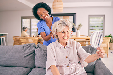 Image showing Nurse brush hair of senior woman in the living room of the modern retirement home for self care. Mirror, routine and African female caregiver doing a hairstyle for an elderly patient in the lounge.