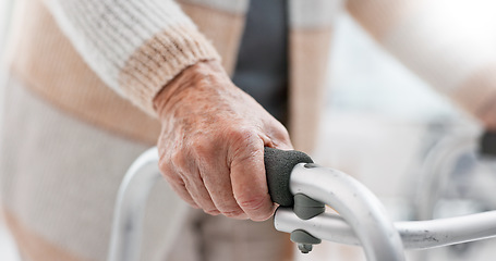 Image showing Hands, walker and an old person with a disability in recover or rehabilitation in a clinic for mobility and stability. Healthcare, medical and physiotherapy with a senior patient in a nursing home