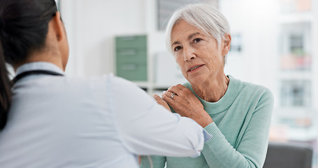 Image showing Physiotherapist, senior woman and check shoulder for rehabilitation help, recovery support or joint injury. Chiropractor consultation talk, elderly patient or physiotherapy doctor for medical service