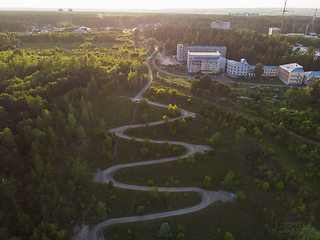 Image showing Aerial top vew of winding road in the city