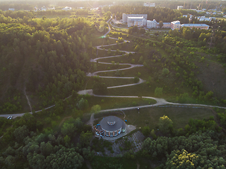 Image showing Aerial top vew of winding road in the city