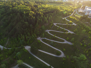 Image showing Aerial top vew of winding road in the city