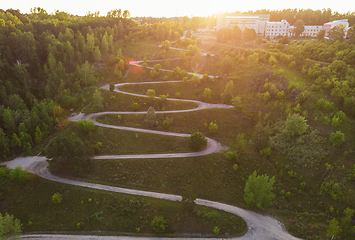 Image showing Aerial top vew of winding road in the city