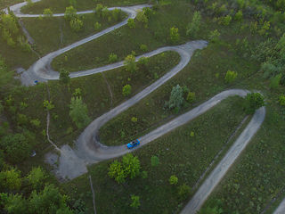 Image showing Aerial top vew of winding road in the city