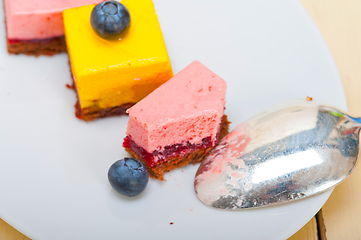 Image showing strawberry and mango mousse dessert cake