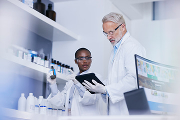 Image showing Science, black woman and man with tablet in laboratory for inventory list of chemicals for biotech research. Scientist team in lab with digital checklist for stock of pharmaceutical product in study.