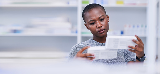 Image showing Pharmacy, product choice and black woman, customer or client reading pills box label, instruction or medication. Mockup space, supplements comparison and African person with medicine brand decision