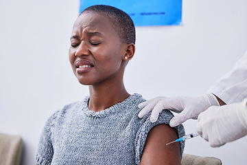 Image showing Vaccine, injection and black woman with fear in clinic for virus protection, vaccination and flu shot. Healthcare, phobia and patient with pain from needle for medicine, treatment and antibiotic