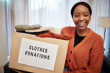 Image showing Clothes donation, charity and woman portrait with box for nonprofit and cardboard container at home. African female person, donating and house with giveaway for community support with packing