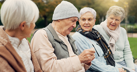 Image showing Friends, talking and senior people in park for bonding, conversation and quality time together outdoors. Friendship, happy and elderly man and women in retirement on bench for relaxing in nature