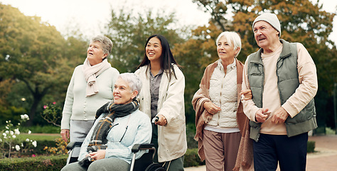 Image showing Friends, walking and elderly people in park for bonding, wellness and quality time together outdoor. Friendship, health and senior man and women with caregiver in nature for fresh air, calm and relax