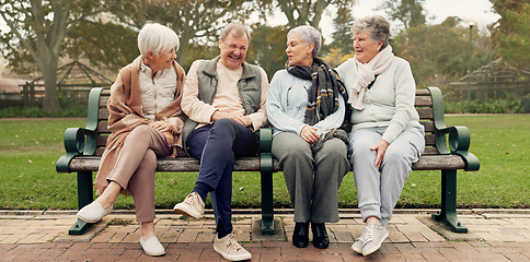 Image showing Conversation, nature and mature friends in a park sitting on bench for fresh air together. Happy, smile and group of senior people in retirement in discussion or talking in an outdoor green garden.