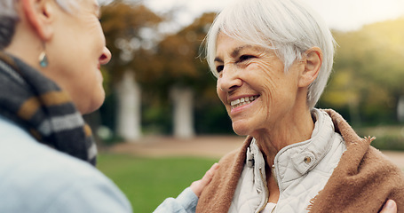 Image showing Love, care and senior women embracing for affection, romance and bonding on an outdoor date. Nature, commitment and elderly female couple in retirement hugging in a green garden or park together.