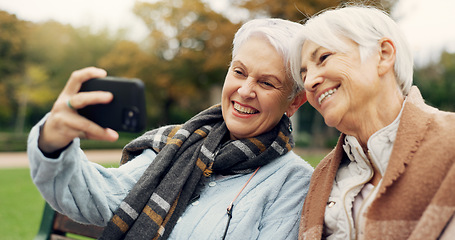 Image showing Senior, women and selfie in a park happy, bond and relax in nature on a bench together. Friends, old people and ladies smile for social media, profile picture or memory in forest chilling on weekend